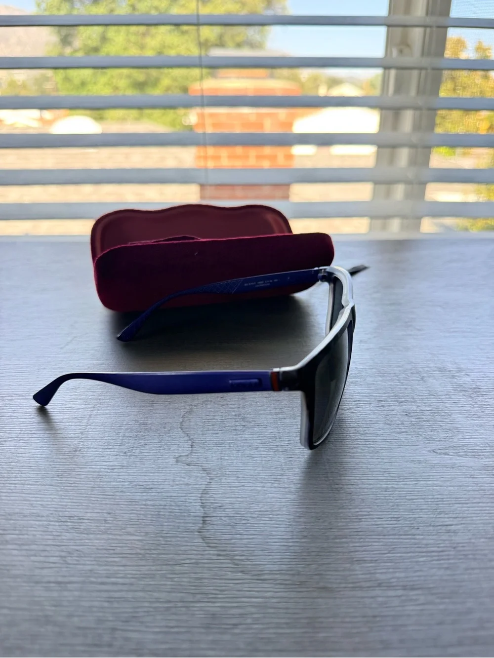 Gucci Black Frame Sunglasses with blue sides and Dark Lenses and Maroon Case